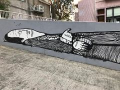 03B Alex Senna - elongated mural of man and dog - detail 1 street art Hong Kong
